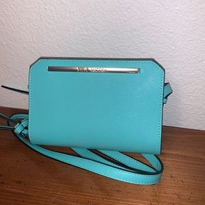 Steve Madden small teal/turquoise crossbody clutch. Multiple compartments.